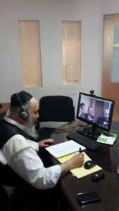 Rabbi Carmel with Antwerp counselors-in-training via skype