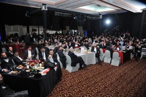 Guests listening to one of the evening's speakers